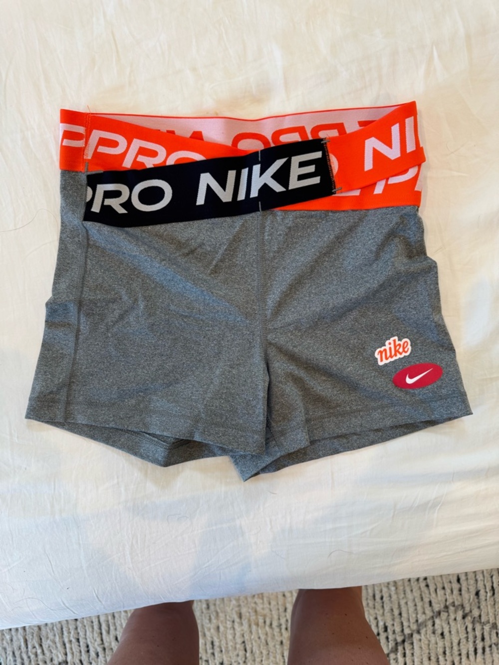 Nike Pro 3” Women's Gray Athletic Shorts with Orange Waistband